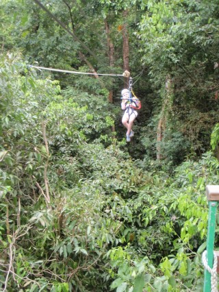 Whoosh! Here I am zip-lining through the jungle!