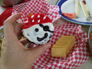 A pirate cupcake at a pirate picnic